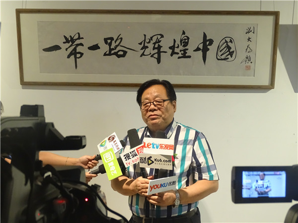 环球文化艺术网副主编、宣和艺术院秘书长杨东亮采访